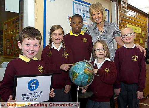 World class... Angela Grant, International Schools co-ordinator, is pictured with (from left to right) Joshua Barcroft, Lucy Wells, Aaron Biggs, Jemma Gregory and Marcus Hunt 
