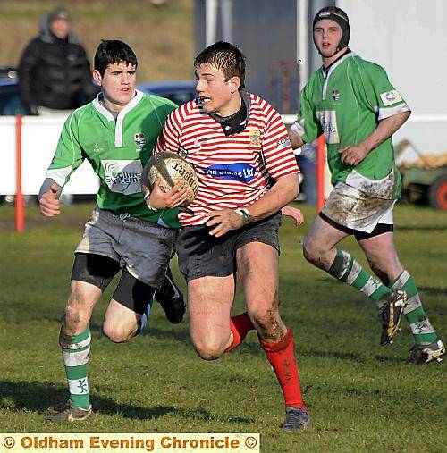 MARK GOODMAN . . . in the thick of the action for Oldham RU. 
