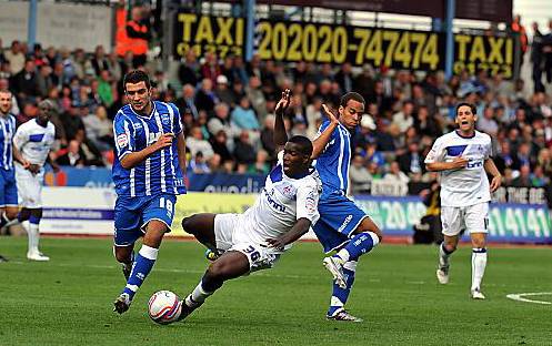 ACTION MAN . . . Oumare Tounkara puts himself about for Athletic. 