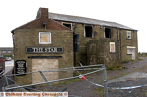 GUTTED . . . the shell of the Star Inn pictured this morning after the fire. 