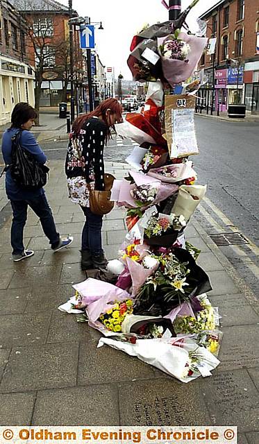 FLORAL tributes were laid at the scene of the deadly attack 