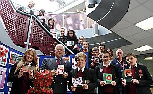 Failsworth School showing off their poppy tributes 
