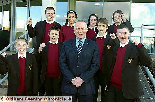 ON THE UP . . . Delighted Failsworth School head John Meagher with pupils (from the left) Leah Winstanley, Jake Smith, Wiliam, McCullam, Chelsea Seale, Amy Moss, Oliver Phythian, Neave Hesling. 
