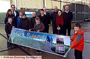 PROUD: Janet Rylance (second left) and her daughters Olivia (left) and Hannah (fourth left) with some of the people who helped to raise money in Mark’s memory (from the left), James Warrington, Jacob Vink, Helen Kulczycki, Noah Vink, Rose Tipton from Macmillan, Charlie Connoly, Richard Vink, Naomi Regan, Denis Keaskin and Sammy Vink
