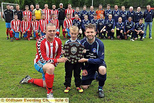 SHOWDOWN . . . Highfield United captain Jake Buckley (left) and Rifle Range Royal Blues counterpart Richard Massey flank Rifle mascot Harrison Dale ahead of kick-off in the Oldham Sunday League David Giblin Division One Shield final. 