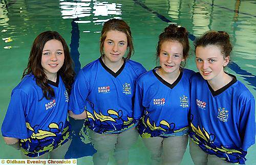 ALL SMILES: Jennifer Kerr (left), Fran Chiappe, Lucy Sherrin and Evie Williams, who made up Hulme Grammar’s successful Year Nines team. Fran swam 19.73 seconds in the butterfly, an Oldham Schools record. 