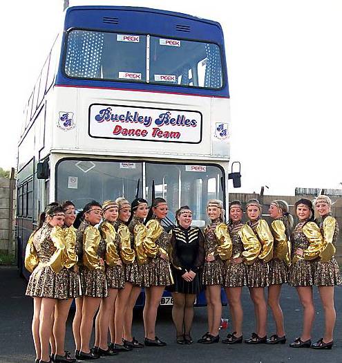 Buckley Belles senior dance team with their bus  

