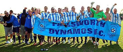 TITLE TRIUMPH... Failsworth Dynamos players and staff celebrate winning the Lancashire Amateur League Premier Division title following a comprehensive 6-2 victory over Little Lever.
