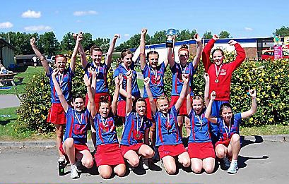 MILES OF SMILES... Oldham Netball Club were a happy bunch after victory for the under-12s (left) at the Brean Sands competition in Somerset