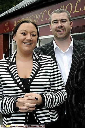 Clare and Mike Appleby outside their new premises in Failsworth 
