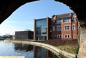 The recently refurbished Failsworth Town Hall with its modern glass extension. 
