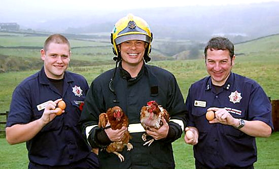 firefighter Steve Broadhurst (centre) is pictured with fellow Oldham Green Watch colleagues Jim Elleray and watch manager Jon Nolan 
