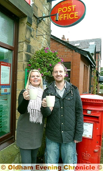 SAVED ... Paul Borg and Janet Waite have bought the popular Diggle Post Office 
