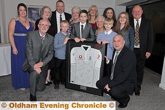 Family and friends and one of the many auction pieces Ashes Sqaud signed shirt. 