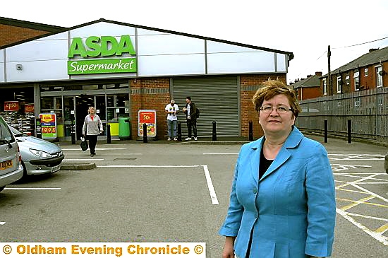 OPPOSITION . . . Councillor Jean Stretton at Asda, Hollins Road, close to the Ladbrokes site 

