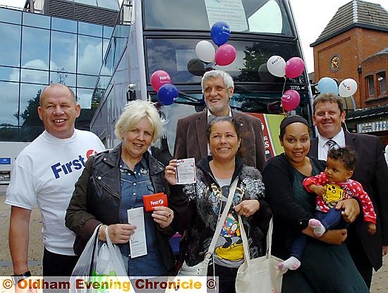 First Bus managers meet customers in Oldham town centre. Left to right, Patrick O'Sullivan (First staff development coach), Beverley Holdaway, Deborah O'Connell, Royce Franklin (Saddleworth Parish councillor), Rebecca Williams, Maya Williams (7 months), Ian Hulse (depot manager for First in Oldham). 
