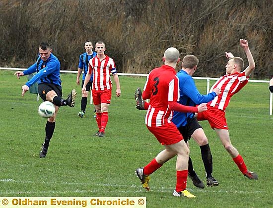 FULL POWER . . . Avro’s Lee O’Brien fires in a free-kick (above, left). 
