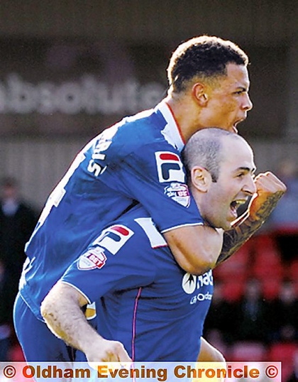 Gary Harkins celebrates his goal at Crewe with Jonson Clarke-Harris. Harkins got the crowd off their seats with some exciting individual displays.  