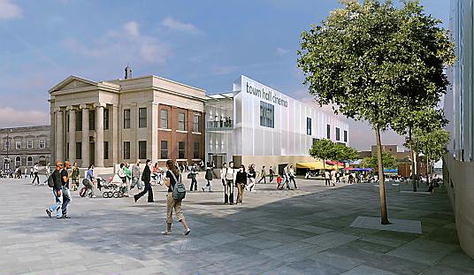 Oldham Town Hall: work has now begun on the glass addition seen in this artist’s impression. The real building is currently completely shrouded