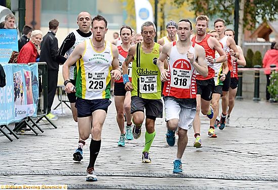 FEELING the burn . . . runners go through the pain barrier