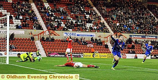 Danny Philliskirk celebrates after scoring the match-winner.