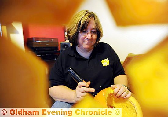 Adele Richards models pumpkins for charities
