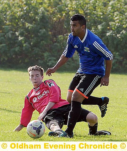 ON THE ATTACK: Westwood’s Salah Uddin tries to shake of the attention of GPO’s Damion Hirons.