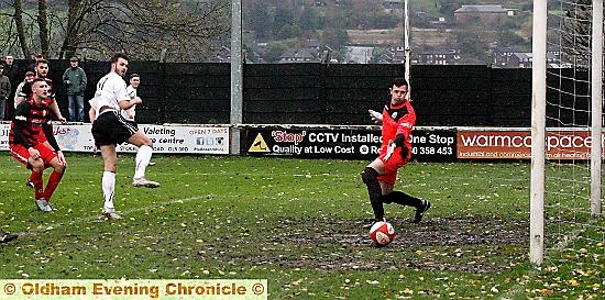 Mitch Bryant, scores the second goal for Mossley. 
