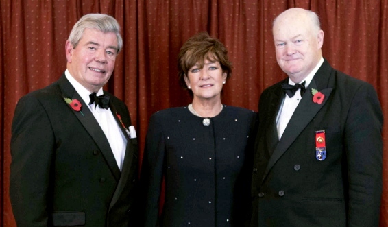 SUPER fan . . . Sir David Trippier, left, has revealed himself to be a Latics supporter. He is pictured with his wife Lady Trippier and Peter Lowndes, provincial grandmaster.