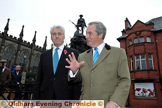 UKIP leader Nigel Farage on the campaign trail in Oldham with by-election candidate John Bickley