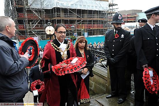 Oldham Remembrance Day service. The Mayor Cllr. Ateeque Ur-Rehman and Mayoress Cllr. Yasmin Toor lay the first wreath.