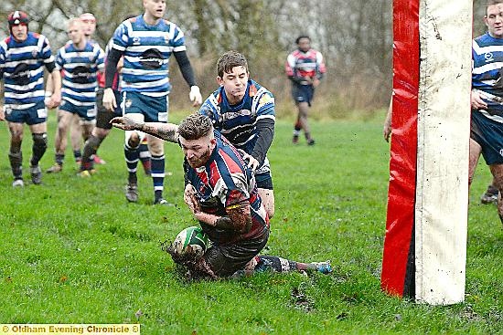 THE ONE THAT GOT AWAY: Rhys Wareing spills the ball with the line beckining.