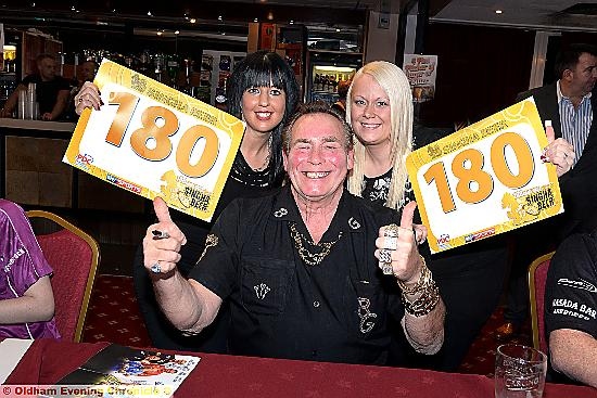 THUMBS UP FOR OLDHAM . . . Bobby George with local darts player Rachel Mawdsley (left) and Angi Taylor at the Night of Champions. PICTURES by TIM BRADLEY.
