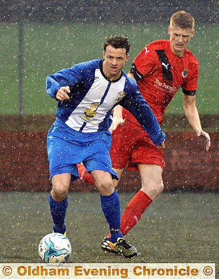 GOING FOR GOAL: Hollinwood’s Jamie Moore leaves an opposition defender trailing in his wake at Chapel Road.