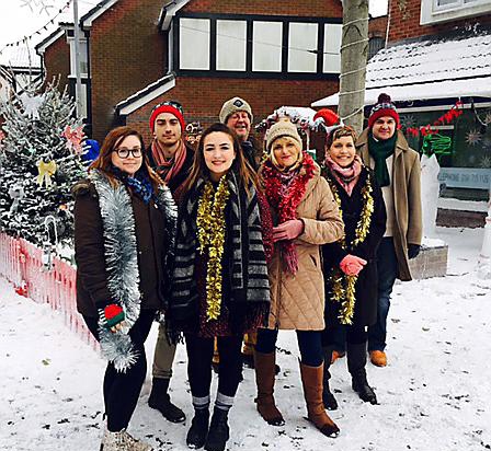 carol singers . . . (from left) Sam Kearney, Toby Cryne, Ella Kay, Peter Wakefield, Lesley Abbott, Dawn Allison and Matt Murphy