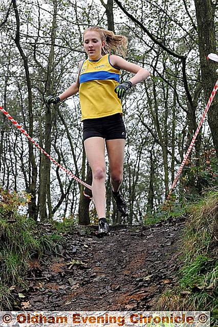 Olivia Green makes it five in a row at the Oldham Secondary Schools’ Cross-Country Championships. PICTURE: VINCENT BROWN