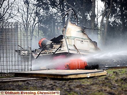 THE smouldering caravan