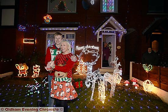 Josh and his mum Jennifer switch on the Christmas lights at their Moorside home