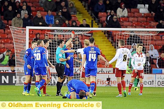 seeing red: Sheffield United’s Che Adams (hidden) gets his marching orders after tussling with Athletic skipper Liam Kelly (on floor).