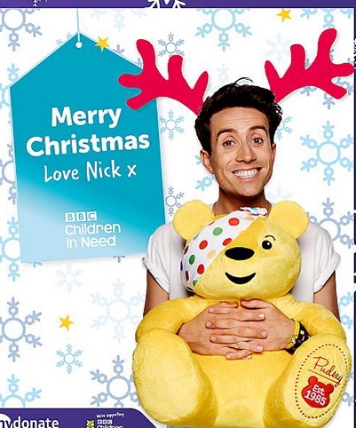 Nick Grimshaw posing on his charity Christmas card