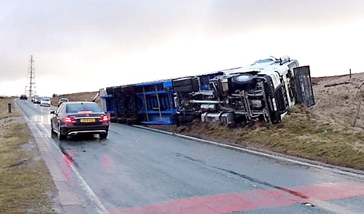 reader Geoff Bayley captured this overturned lorry near - appropriately - Windy Hill on the Oldham Road at Denshaw