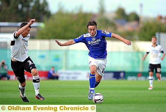 JOSE Baxter (right) in action for Athletic.