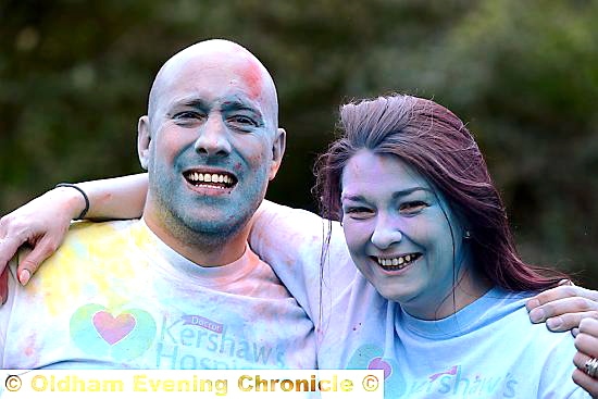 GETTING colourful . . . Revolution 96.2 presenter Elliot Eastwick and Lisa Pearson (Dr Kershaw’s) test out the colour blast equipment