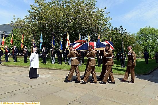 WO Creighton’s colleagues carry his coffin at church