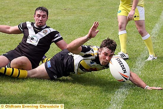 Gareth Morgan is beaten to the ball. PICTURE: PAUL STERRITT