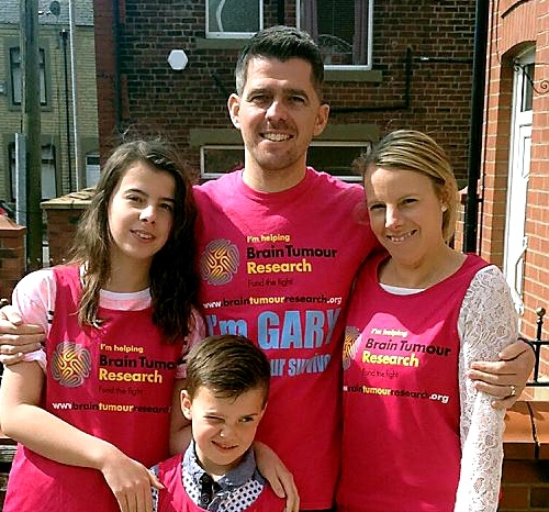 Gary with wife Claire and their children Poppy and Toby