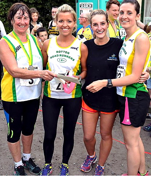 the winning women’s team: Jennifer Bloor (2nd left), Jane Augsburger and Tawnia Norman receive their prize from RRR president June Allingan (left).