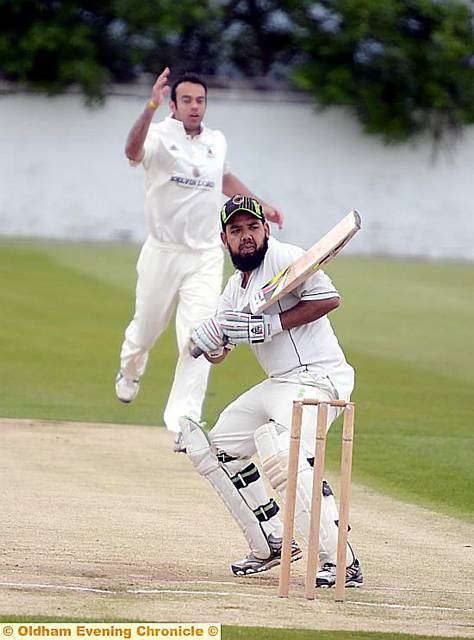 DUEL . . . Friarmere’s Imran Khan leaves alone a delivery from Moorside’s Kyle Hodnett during the latter team’s