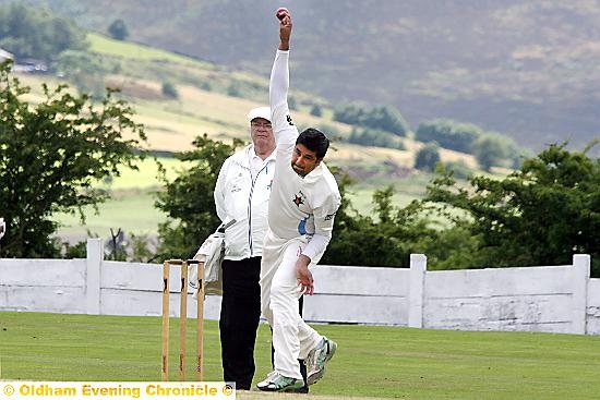 CONCENTRATION . . . from Saddleworth professional Imran Aslam during yesterday’s Tanner Cup semi-final at Micklehurst. 