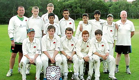 SHIELD SUCCESS . . . the Glodwick ‘A’ team of Richard Connolly (manager, back row, left), Ben Frost, Ben Brierley, Adam Shazad, Hassan Ahmed, Ash Rigby, Sobhan Mirza, Josh Brown, Neil Williams (coach) Nathan Connolly (front, left), Tommy Jones (capt), James Chadwick, Zak McCannon, Aidan Jump.